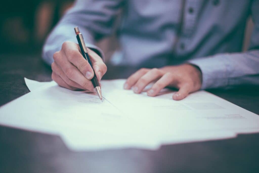 Man Completing Paper Work